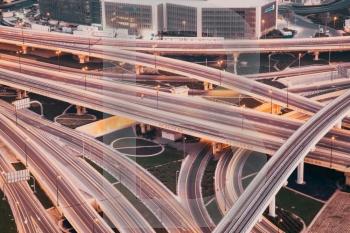 DUBAI, UAE - FEBRUARY 2018: Traffic on a busy intersection on Sheikh Zayed highway