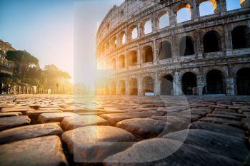 Colosseum in Rome, Italy at sunrise. - The Rome Colosseum was built in the time of Ancient Rome in the city center. It is the main travel destination and tourist attraction of Italy.