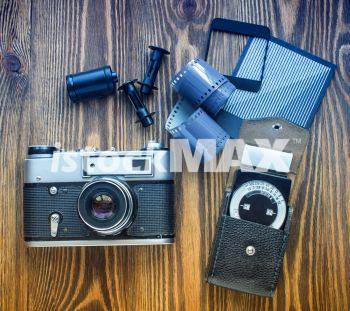 old soviet rangefinder camera,exposure meter and another trappings of film photography. old soviet rangefinder camera,exposure meter and another trappings of film photography.