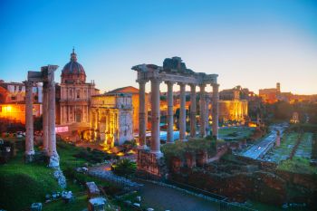Roman forum ruins at the night time in Rome, Italy