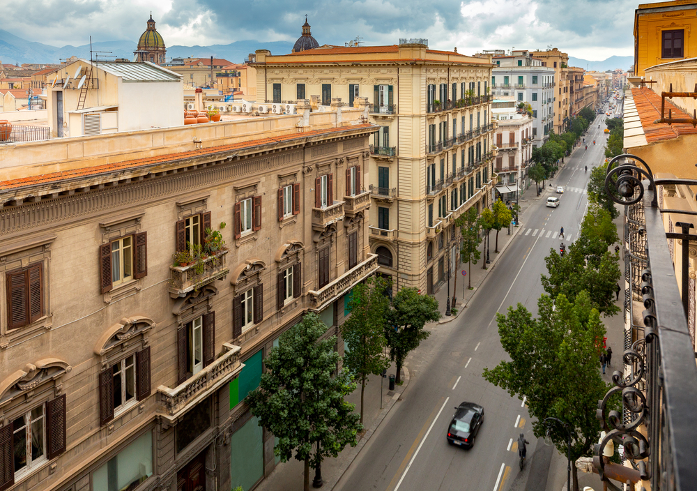 Aerial view of the city and the main avenue of Via Roma. Palermo. Sicily. Italy.. Palermo. Aerial view of the city and Via Roma Avenue.