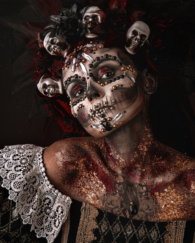 Santa Muerte Halloween Young Girl with creative scull Makeup. Halloween Girl in a Death Costume