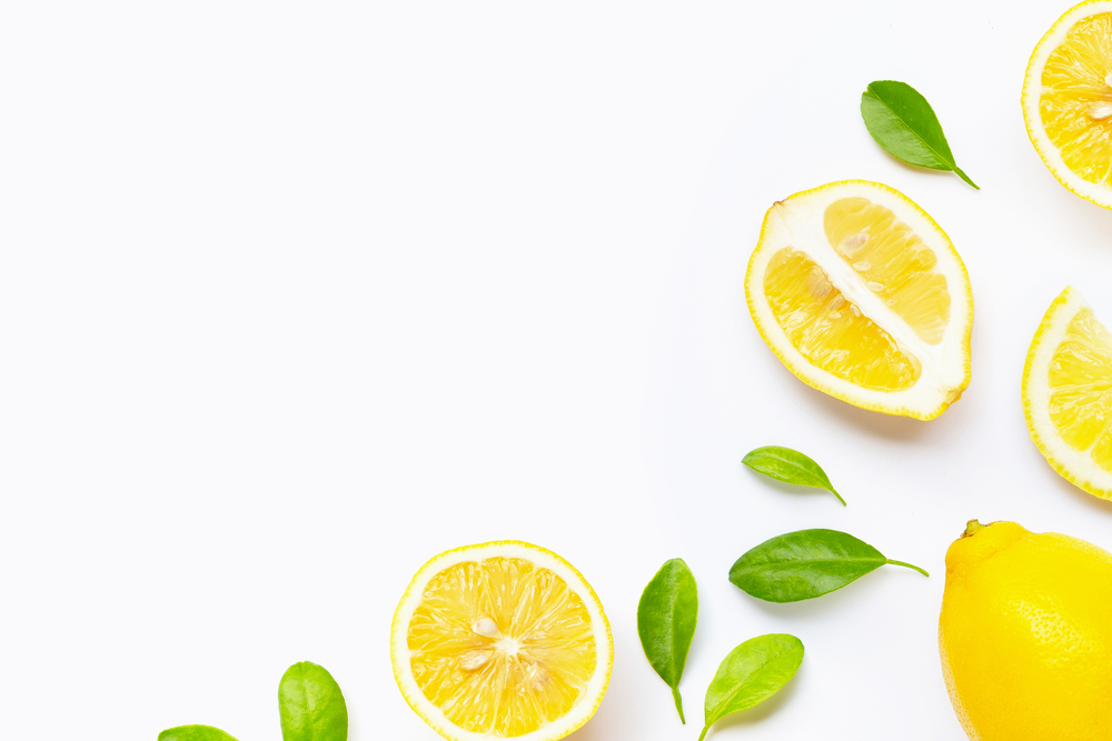 Fresh lemon with slices isolated on white background.  Copy space