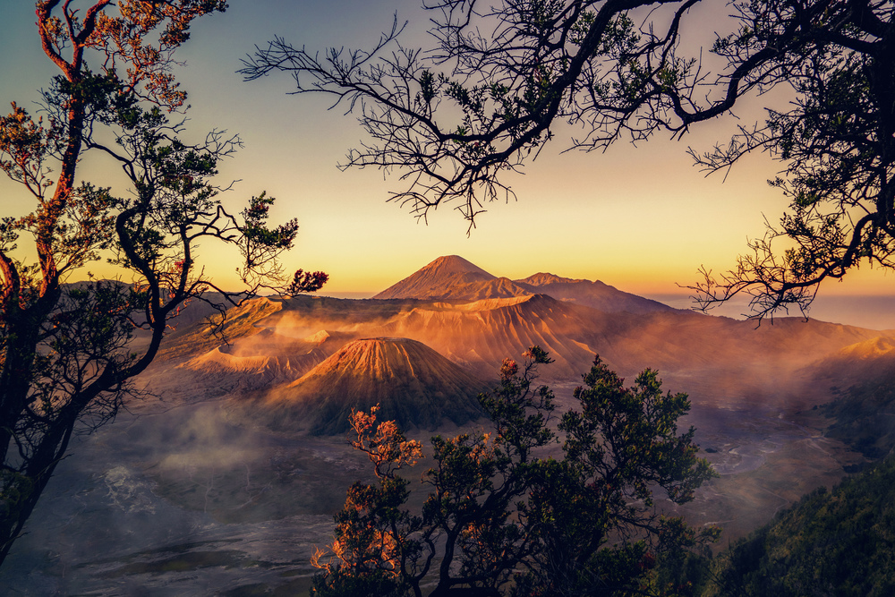 Mount Bromo at sunrise. An active volcano, one of the most visited tourist attractions in east Java from viewpoint, Indonesia. Natural landscape background.