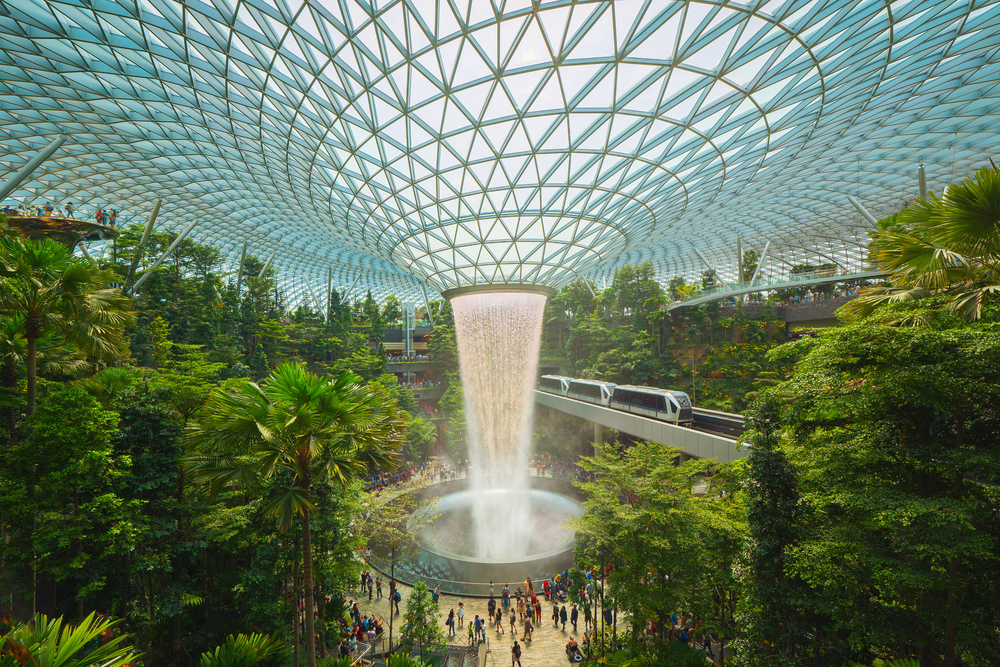 Jewel Changi Airport in Singapore City. Interior design decoration with waterfall, garden and trees. The world&rsquo;s best airport and destination