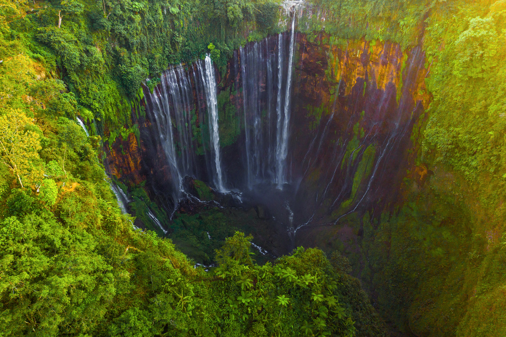 Aerial top view of Sewu Waterfall. Nature landscape of Jinguashi in natural area. it is located in Indonesia for travel trip background, tourist attraction. Top view