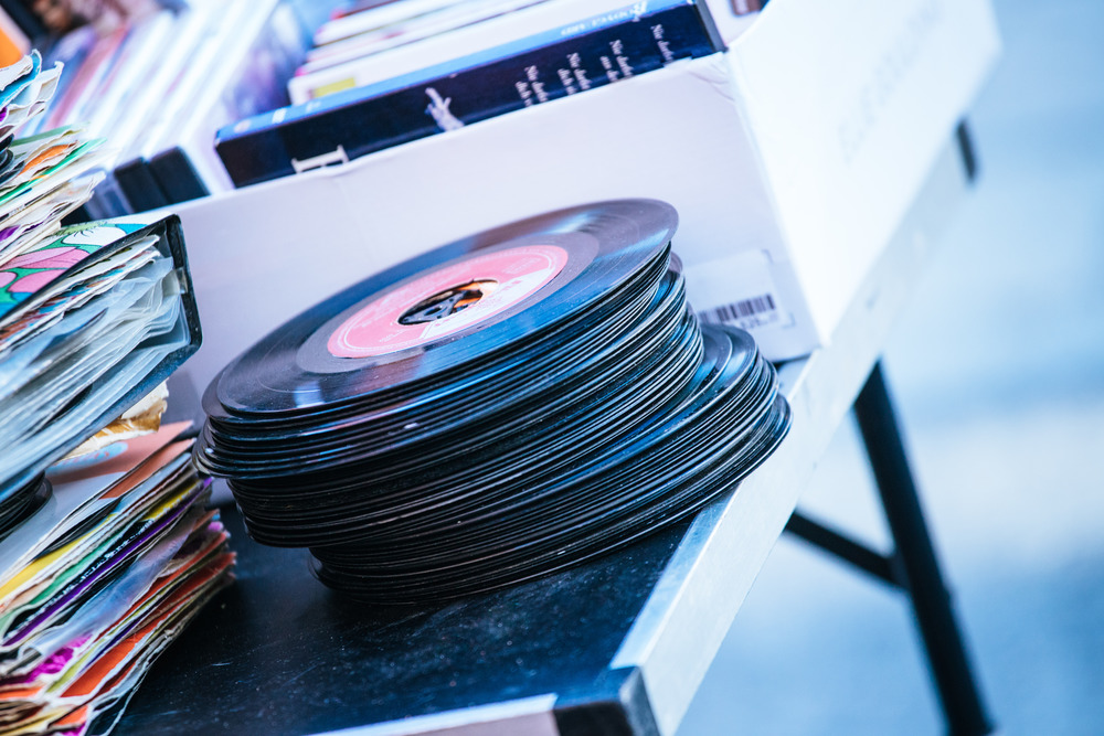 Retro vinyl records on a flea market, summer time