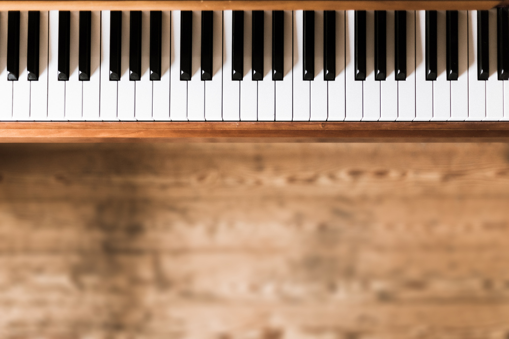 Vintage wooden piano keys with text space
