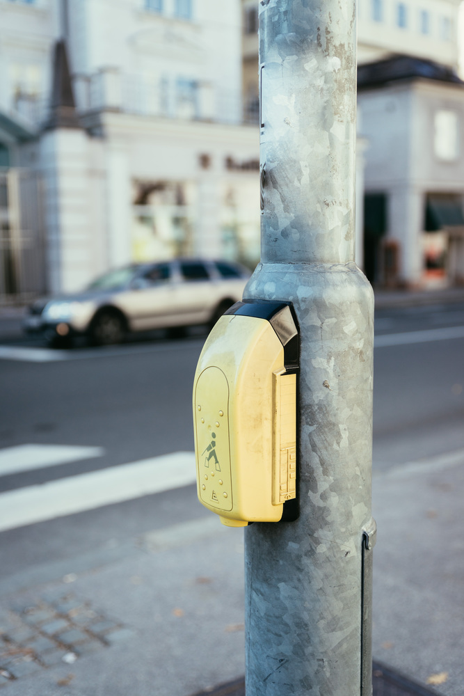 Yellow orientation system on a street light, urban city life