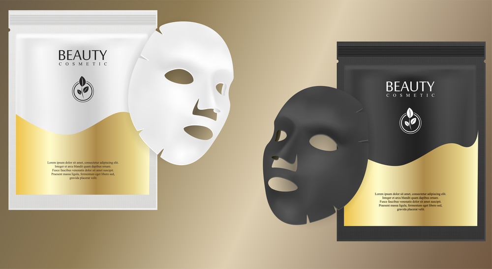 Black and white facial cosmetic mask ads. Realistic vector illustration. Individual sachet package design with label and logo for face mask isolated on metallic background.. Black and white facial cosmetic mask. Realistic