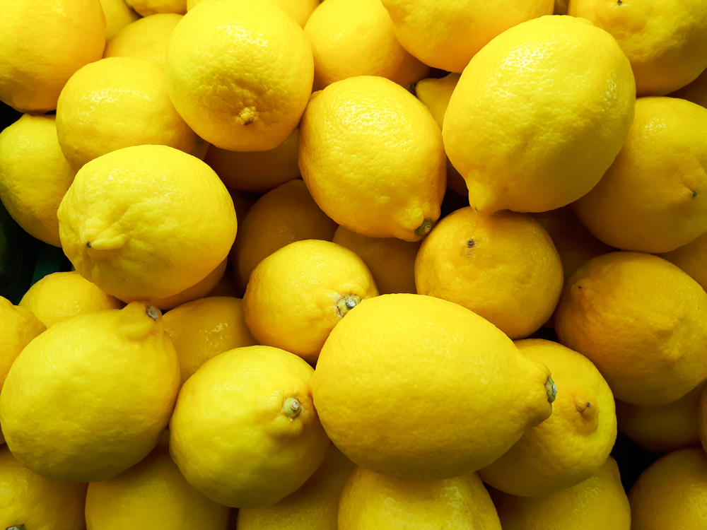 Close up lemon on stall in supermarket