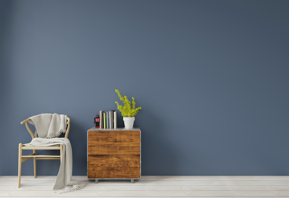 Interior with dark blue green wall wooden chair and wood side table sideboard empty wall for copy space ,3d rendering