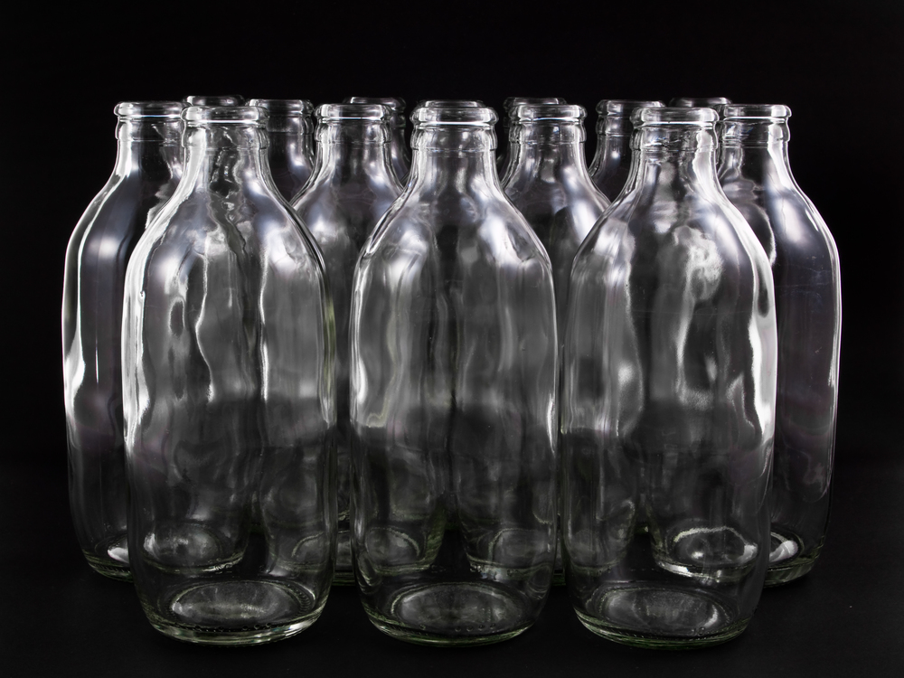 empty bottles collection, colorless, isolated on black background