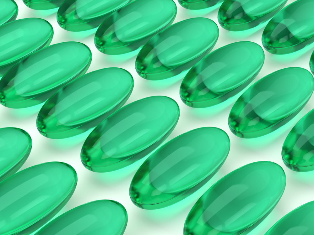 3d render of green gel pills in row