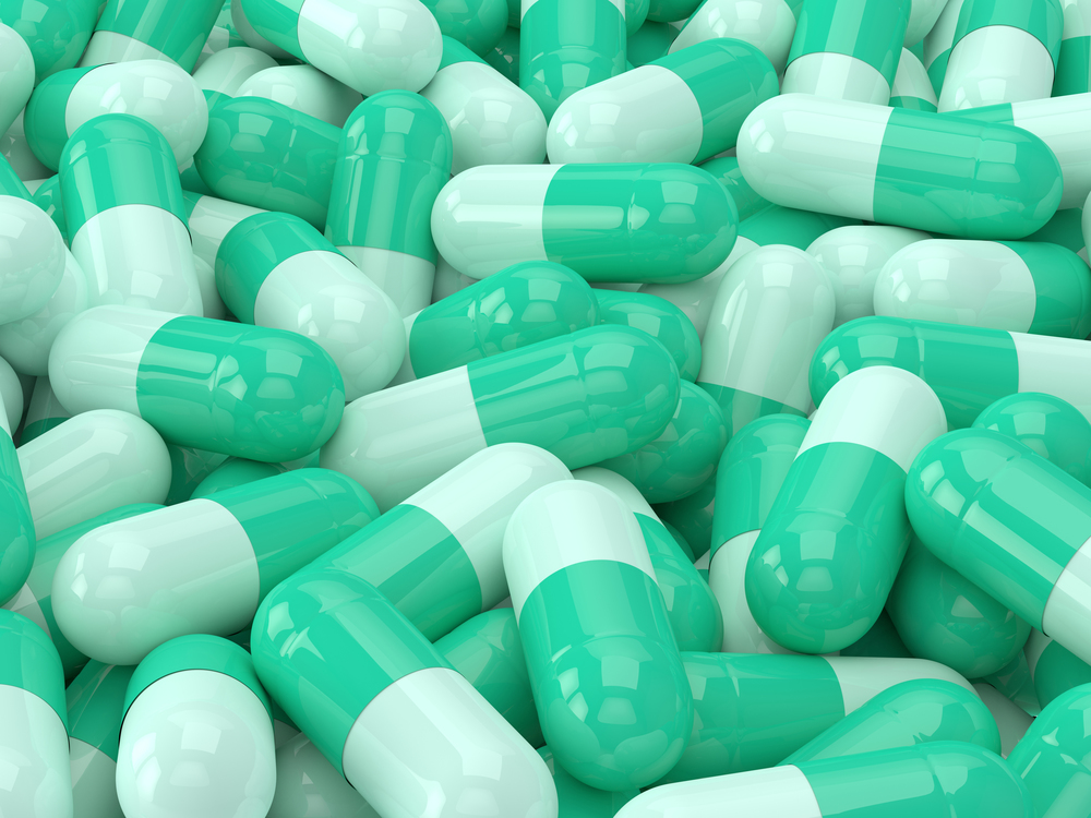 3d render stack of green pills