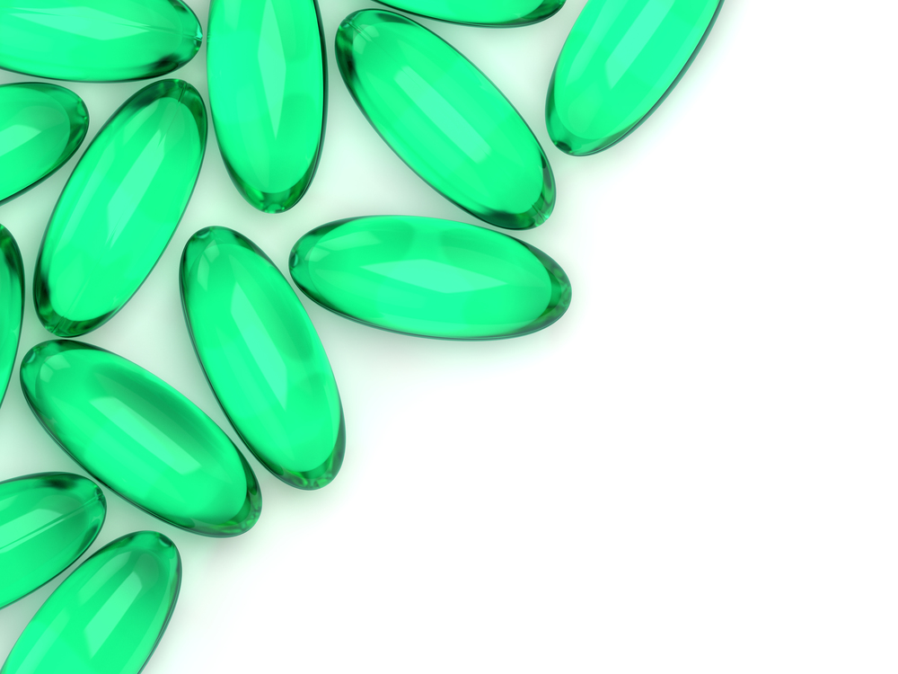 3d render of green gel capsules and place for text