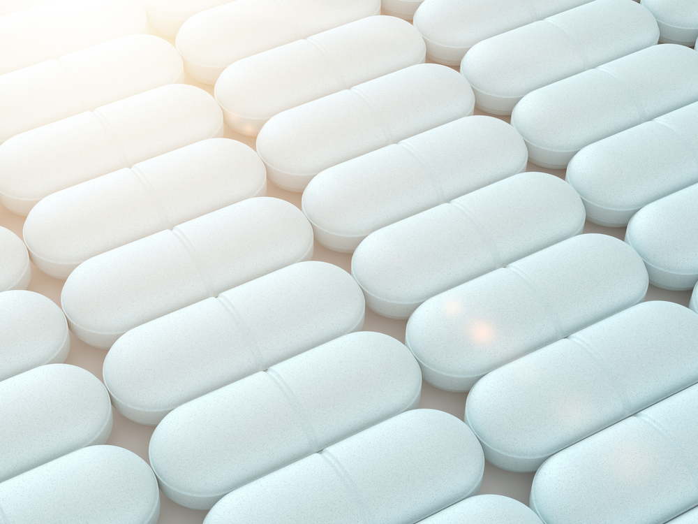 3d render of medical pills in row