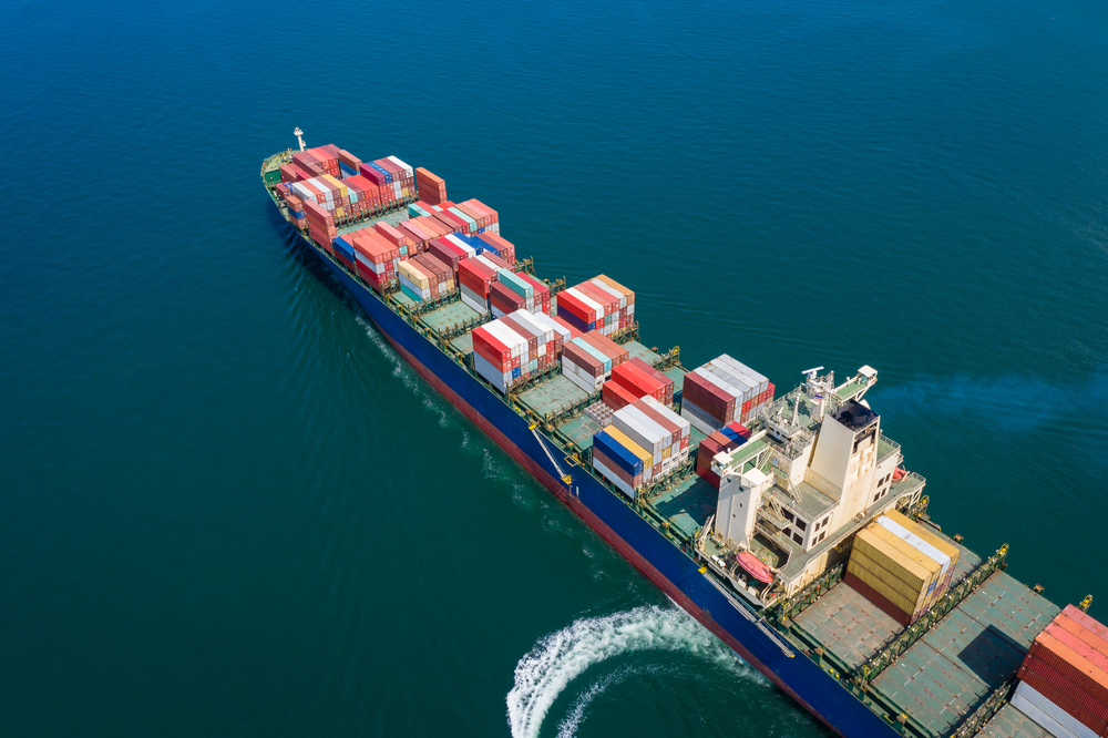 business shipping cargo containers import export and exchange  fright ship open sea asia pacific international from Thailand aerial top view
