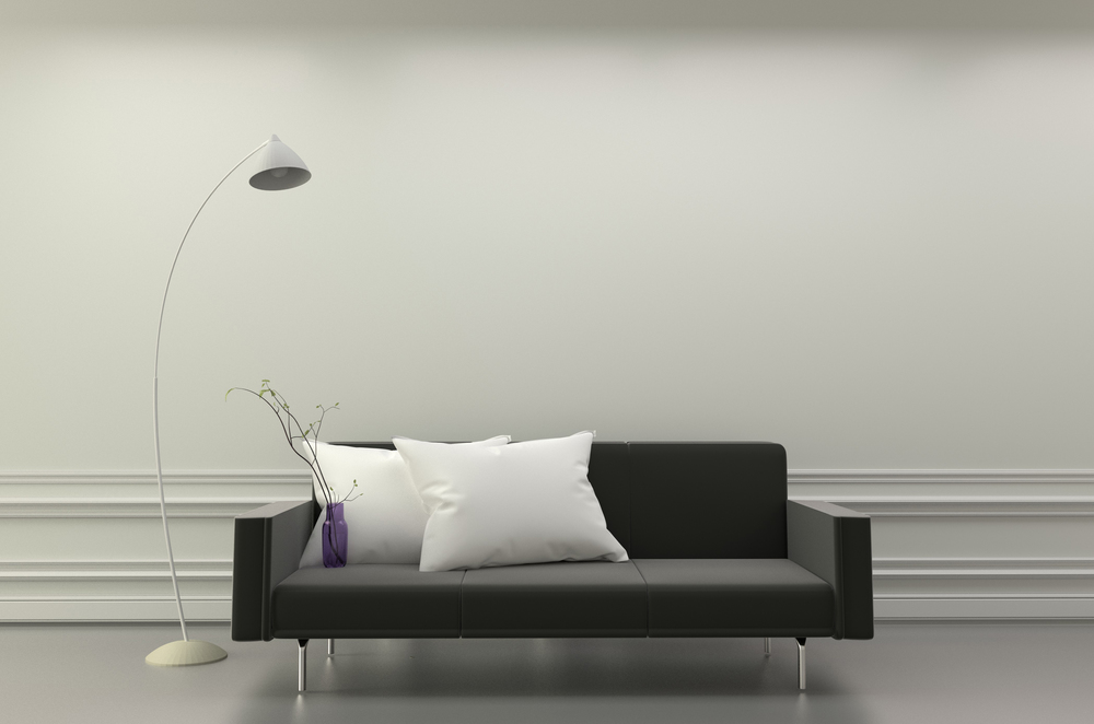 Modern Living room interior - Black sofa and white pillows and lamp - Room white elegant style. 3D rendering