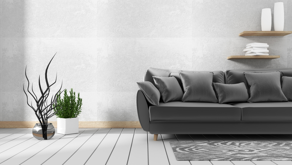 living room interior with sofa and green plants on granite wall background,minimal designs, 3d rendering