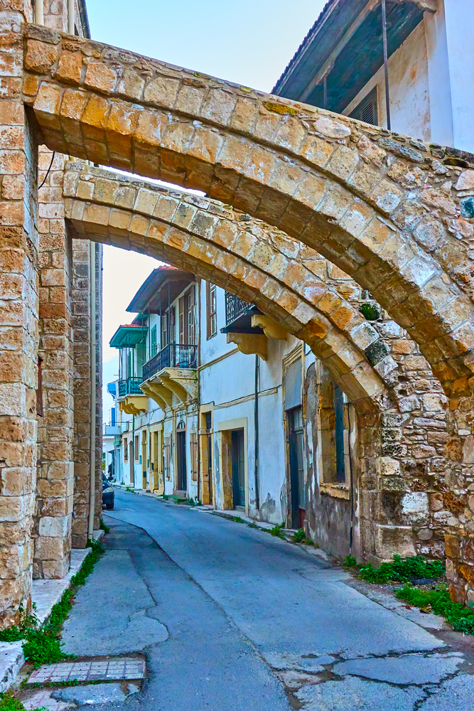 Old street in Larnaca under buttresses of The Djami Kebir mosque, Cyprus