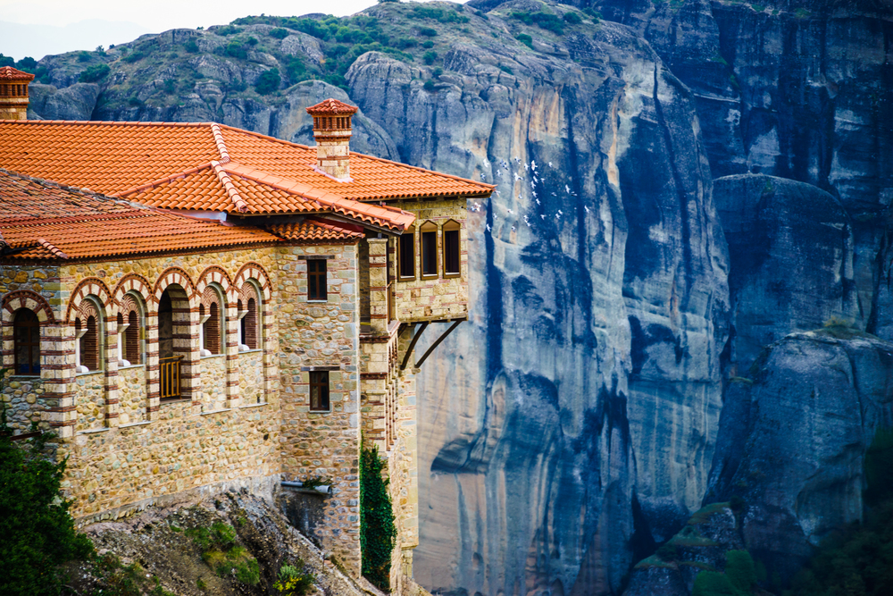 Monastery on cliff in Meteora, Thessaly Greece. Greek destinations. Monastery in Meteora, Greece