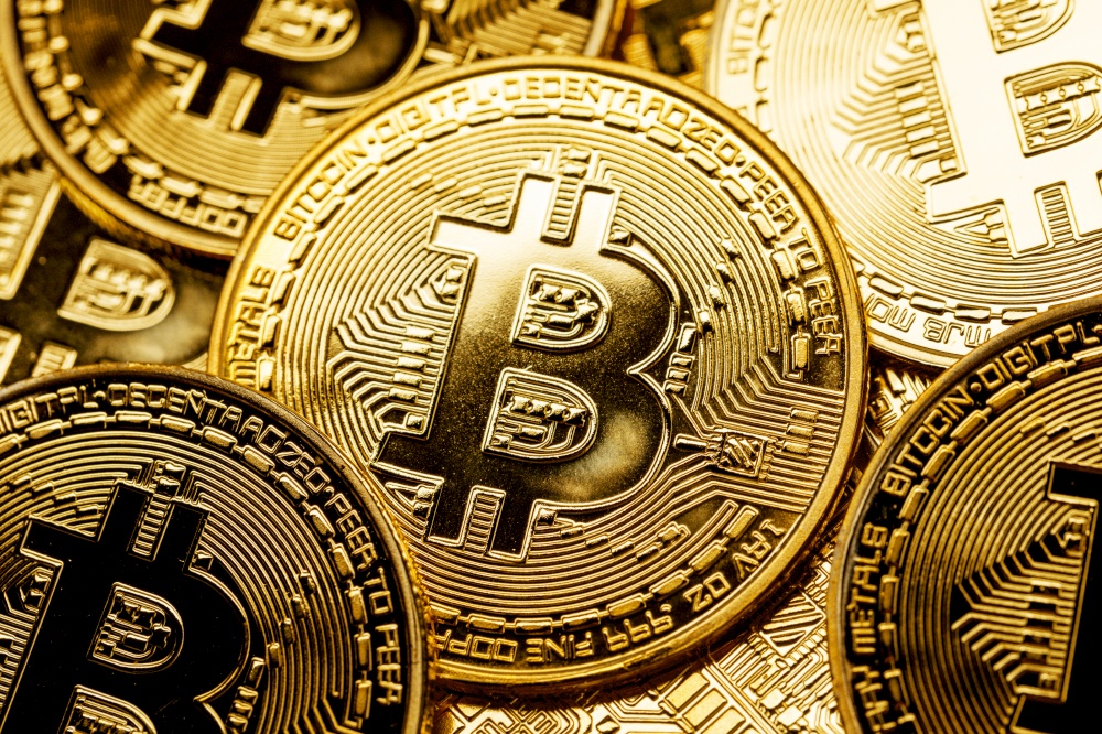 Background of gold coins with bitcoin sign. Background of bitcoins