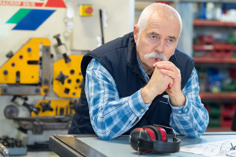 portrait of an industrial worker resting