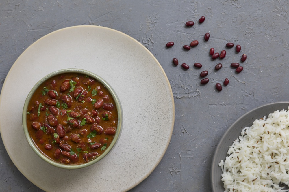 GARNISHED RAJMA CURRY SERVED WITH COOKED RICE