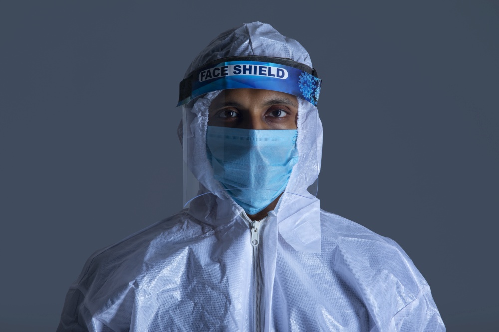 Portrait of a corona warrior in protective suit