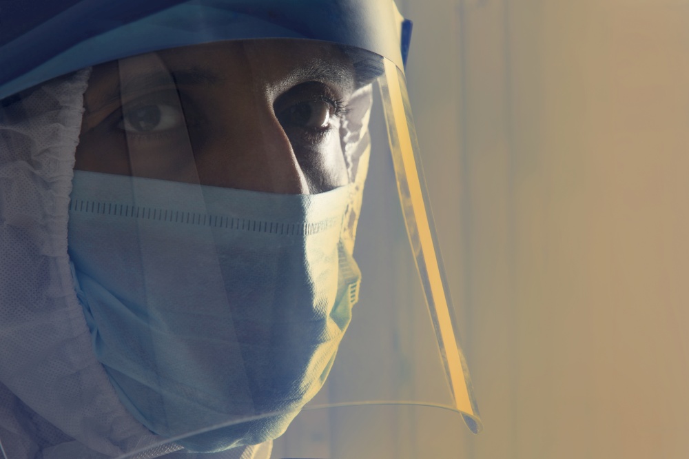 Close up of a doctor in PPE kit