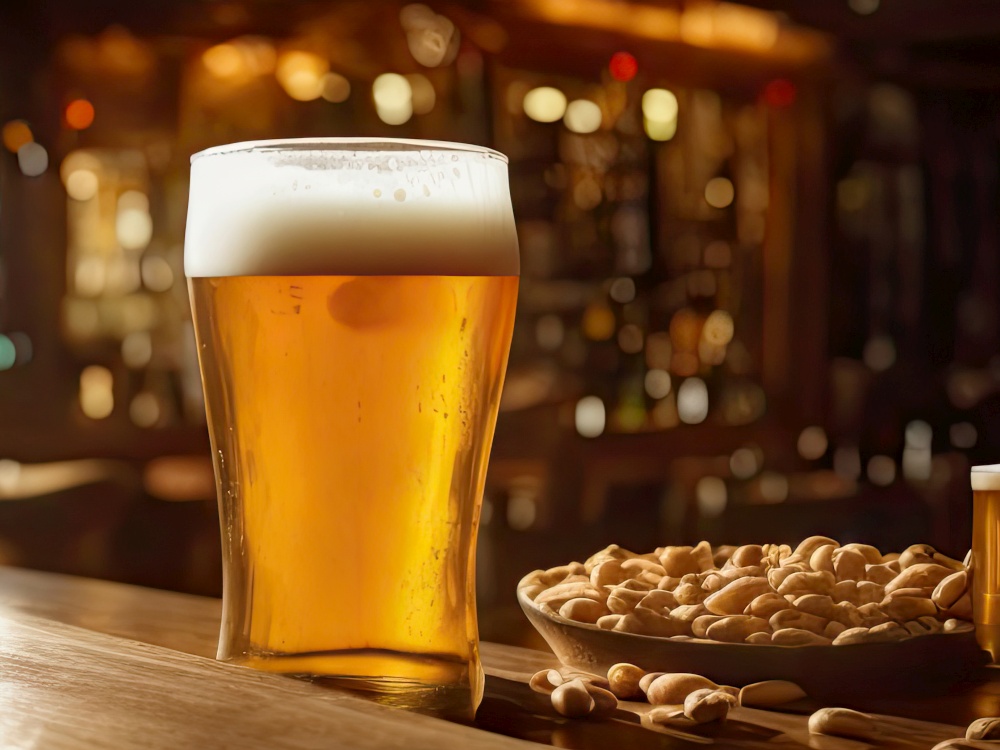 Cold beer in a large glass with a big bowl of peanuts in a cozy bar environment. The beer is frothy and golden, its chilliness and crispness suggesting a satisfying refreshment. The large glass showcases the generous serving of beer, making it a perfect choice for those looking for a satisfying drink. The big bowl of peanuts, with their salty and crunchy texture, provide a complementary snack that satisfies hunger and enhances the beer-drinking experience. The cozy bar environment, with its warm lighting and comfortable furnishings, creates an inviting and relaxed atmosphere, perfect for unwinding and socializing. Whether you&rsquo;re grabbing a drink with friends or simply enjoying a night out, this image captures the essence of laid-back and enjoyable bar culture. AI generative illustration
