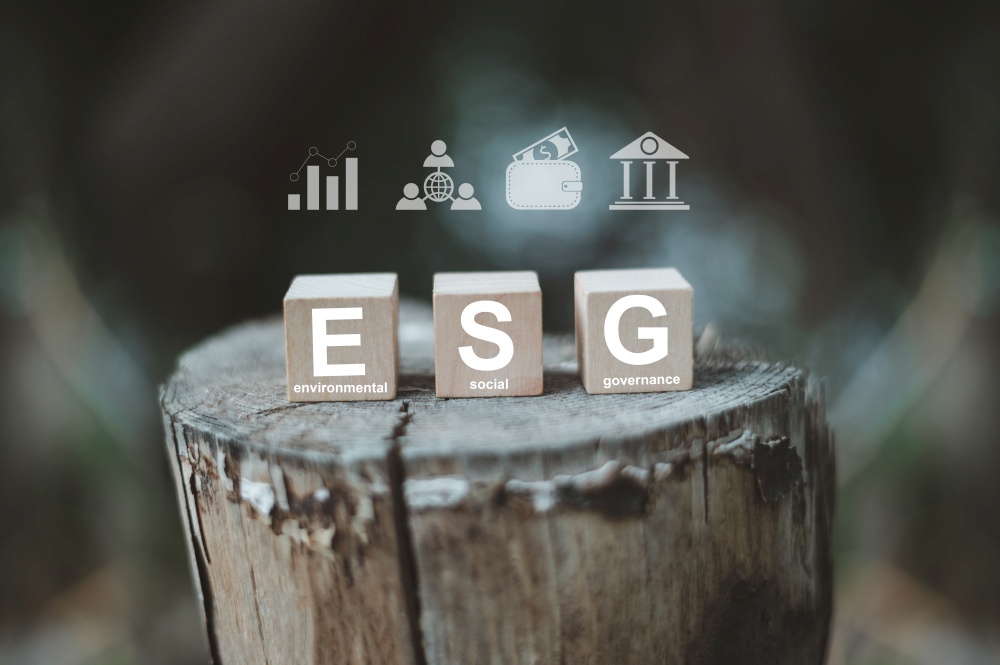 ESG sign on wood cube for ESG concept Environmental Social Governance and  sustainable organizational development.