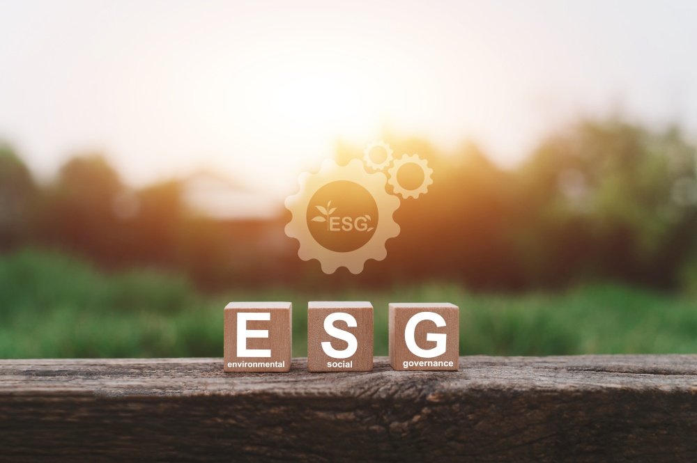 ESG sign on wood cube for ESG concept Environmental Social Governance and  sustainable organizational development.