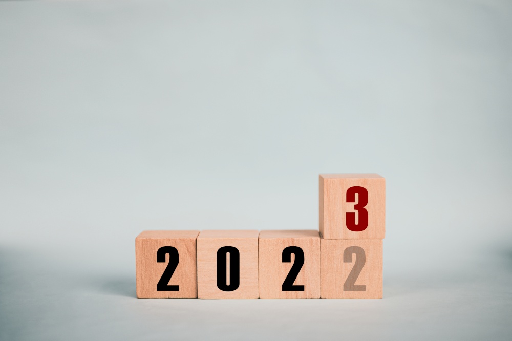wooden cubes 2022 and 2023 concept business change to new success
