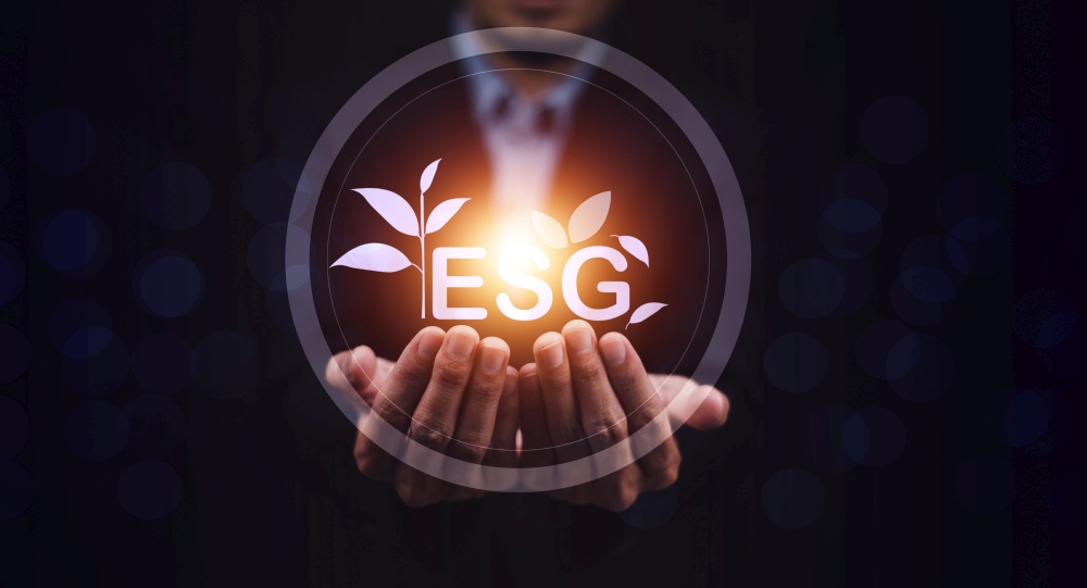 ESG visual screen on hand.ESG environmental social governance business strategy investing concept.