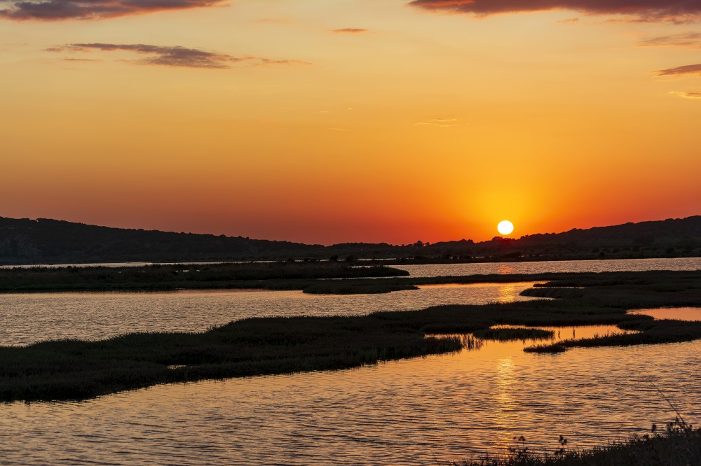 Sunset at the gialova lagoon. The gialova lagoon is one of the most important wetlands in Europe. Greece.. Sunset at the gialova lagoon. The gialova lagoon is one of the most important wetlands in Europe.