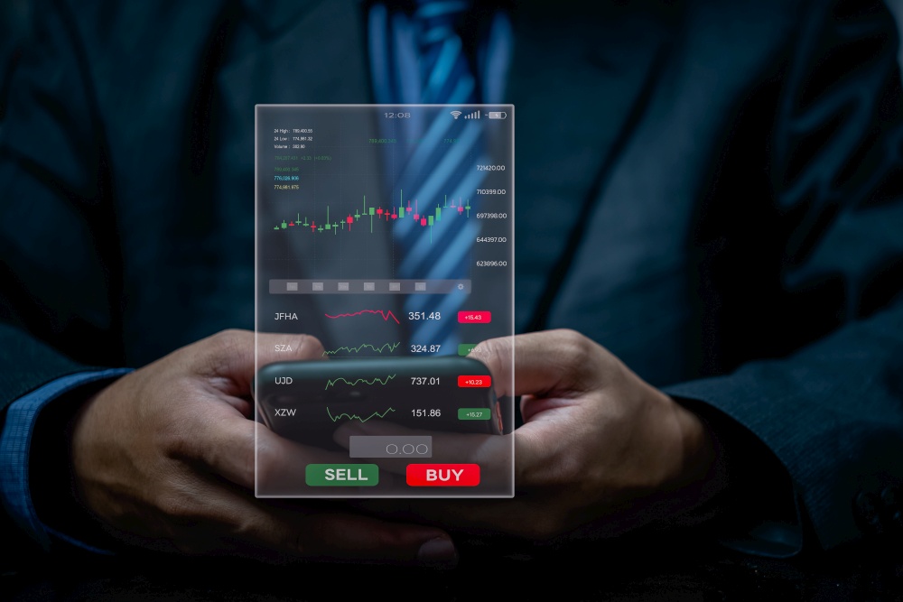 Businessman using mobile smartphone working with stock market investments to report analysis trading data. Statistic exchange graph on screen. Financial stock market.