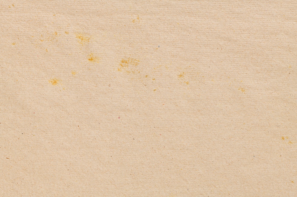 Paper background in beige color tone.