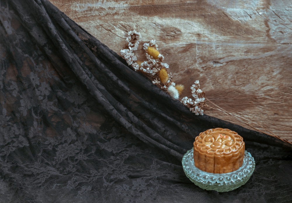 Delicious moon cake. Food served for Mid-autumn festival or Chinese traditional festival, Space for text, Selective focus.
