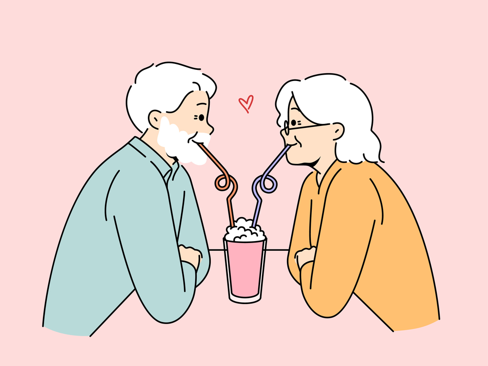 Romantic elderly couple on date, drink one cocktail and experience celebrating wedding anniversary. Date old people in love celebrating Valentine day in cafe demonstrating loyalty in marriage. Romantic elderly couple on date, drink one cocktail and experience celebrating wedding anniversary