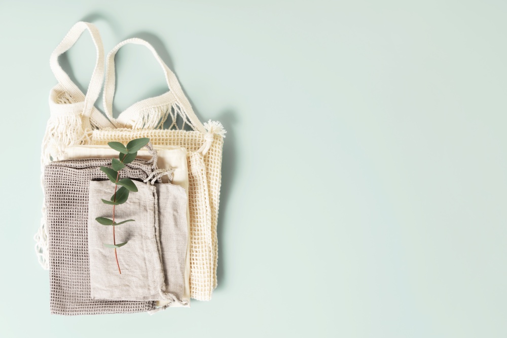 Set of reusable cotton eco bags. responsible consumption, eco-friendly concept flat lay copy space