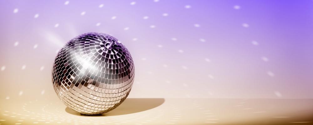 Disco ball on purple and yellow styled background. Disco floor, party, nightlife, going out concept. Banner, copy space