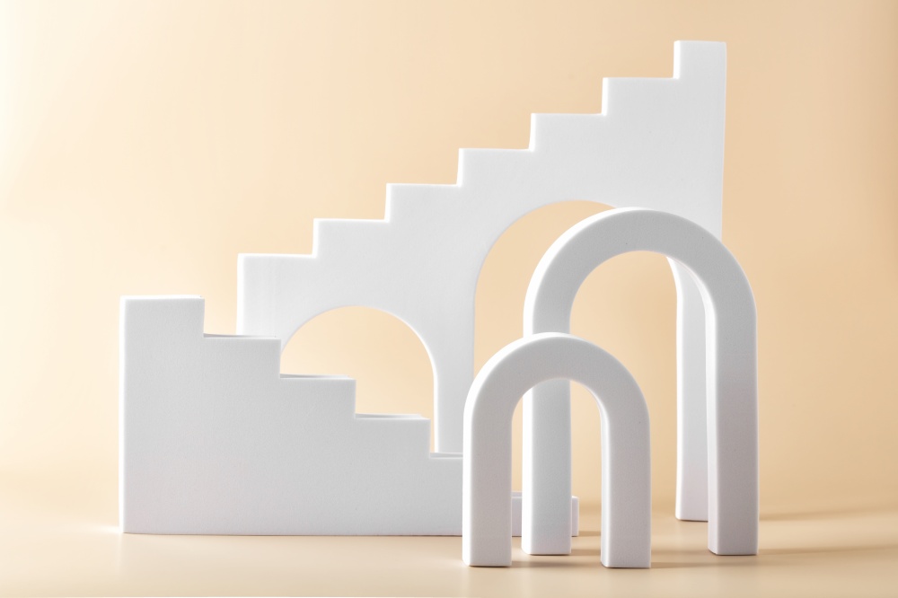Abstract background with various geometrical forms arches and stairs on beige background for product presentation. Podium to show cosmetic products.. Abstract background with various geometrical forms and podiums in pastel color for product presentation