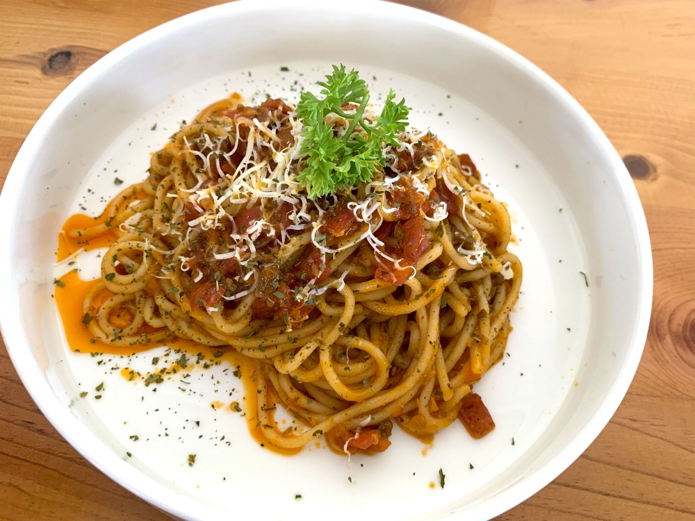 Delicious Spaghetti Bolognese, Pasta with meat, tuna, and tomato sauce and vegetables american italian cuisine