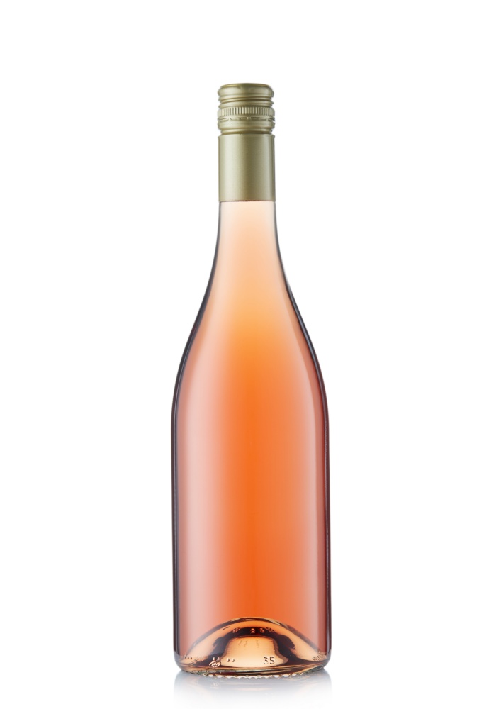 Pink rose wine with golden top on white.