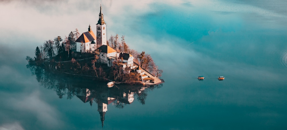 lake Bled in early morning with fog, Slovenia travel