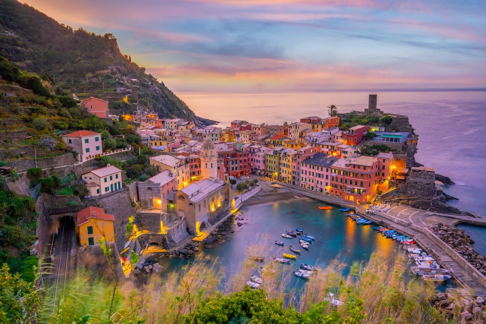 Vernazza, Colorful cityscape on the mountains over Mediterranean sea in Cinque Terre Italy Europe