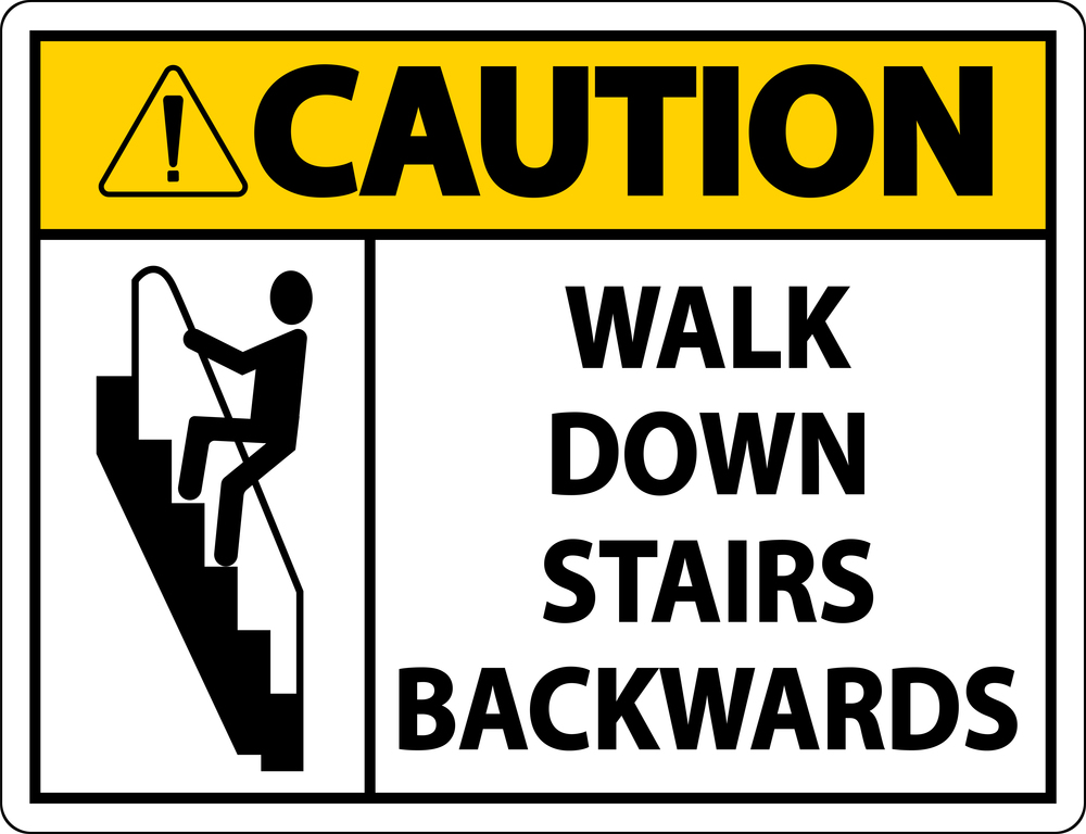 Caution Walk Down Stairs Backwards Sign