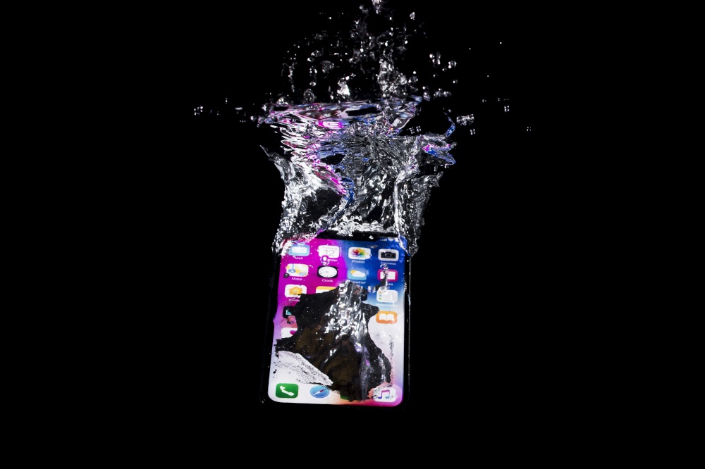 submerged iphone. Resolution and high quality beautiful photo. submerged iphone. High quality and resolution beautiful photo concept